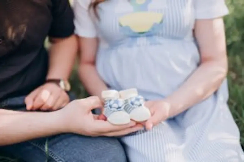 Parents meeting with a birth injury attorney to discuss legal options for their newborn.