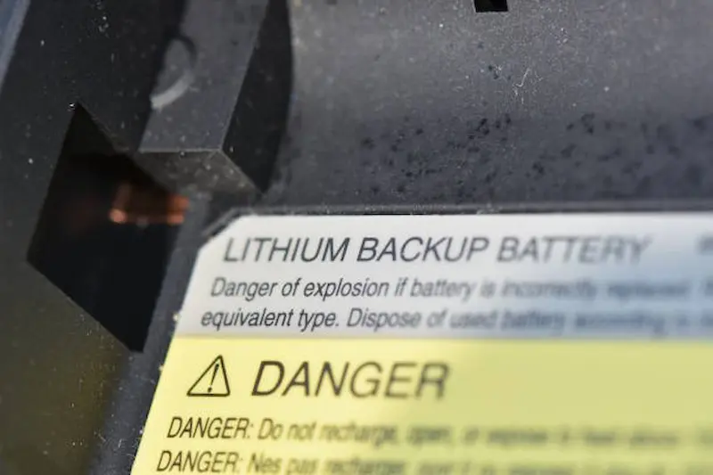Damaged lithium-ion battery after an explosion leading to personal injury.