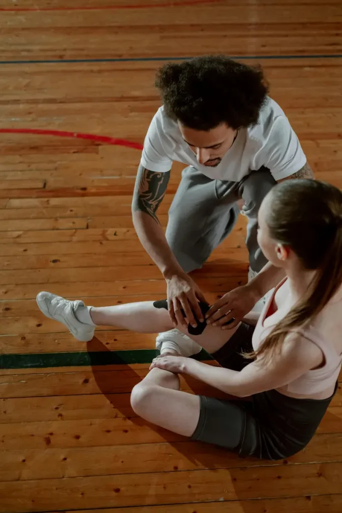 Professional athlete receiving legal advice for knee injury